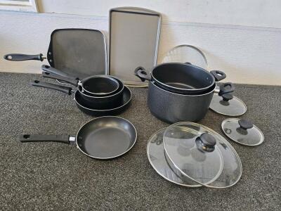 11-Piece Black Nonstick Cookware Set: Fry Pans, Stock Pots, Saucepans, Griddle, Baking Sheet, Lids