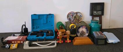 Mixed Household Lot: Bosch Drill Kit (plugged in and functioning), Military Collector Plates, Decor, Tools, & Horse and Carraige