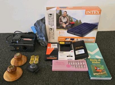 Inflatable air mattress tested and works, handheld jig saw, candle holders, phone cases, birding equipment