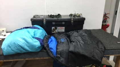 Black Box, (2) Sleeping Bags, and (2) Strings of Outdoor Lights