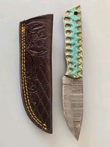 Custom Damascus Steel Fixed-Blade Knife With Patterned Handle And Tooled Leather Sheath