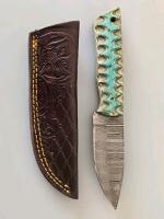 Custom Damascus Steel Fixed-Blade Knife With Patterned Handle And Tooled Leather Sheath
