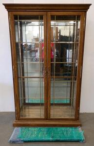 Lighted Oak Curio Cabinet with Mirrored Back, 2 Glass Doors, and Adjustable Shelves