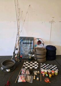 Lot of assorted items, Autographed Racing Checkered Flags, 8 Fishing Rods, 2 Sleeping Bags, Dutch Ovens, Lantern