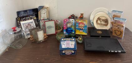 Mixed Lot: X Star Monitor, Ingraham Clock, Dominoes, Frames, Nat Geo Books, Figurines, Plates