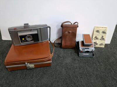 Polaroid SX-70 & J66 Land Cameras with Leather Cases, SX-70 Manual, and Type 48 Film Adapter ( shelf g)