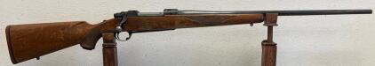 Ruger M77 7mm Rem Mag Bolt-Action Rifle, 24" Barrel, Walnut Stock, Serial 74-30331