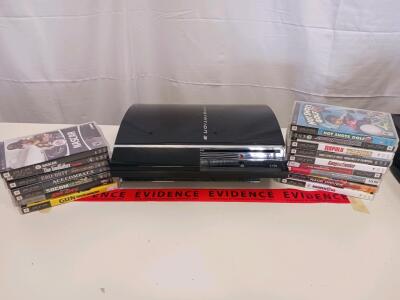 Sony PlayStation 3 Console (Original) with 15 PSP UMD Games, Glossy Black, NTSC