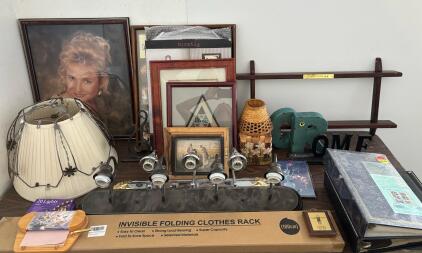 Home Decor Mixed Lot: Vanity Light Fixture, Frames, Lamp Shades, Folding Rack, Albums, Shelf