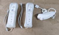 (1) Wii Console W/ Stand, (2) Remote Controllers, (1) Nunchuk Controller, Sensor Bar, AC Adapter & AV Cable, (1) Balance Board & (3) Games - 4