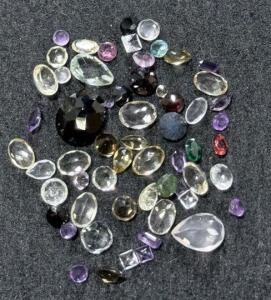 Mixed Lot 55 Loose Faceted Gemstones &ndash; Assorted Colors and Shapes, Estimated 4&ndash;15mm Size Range