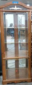 Medium Oak Curio Cabinet with Glass Shelves, Mirrored Back, and Interior Lighting