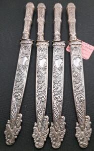 Set of 4 Ornate Silver-Plated Table Knives with Floral Scrollwork Design