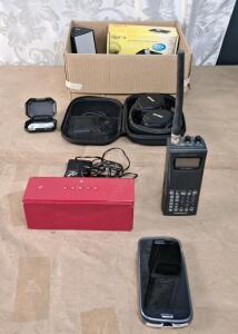 (1) Bluetooth Speaker W/ Charger, (1) Radio Shack Model 20-525 PRO-95 Dual Trunking Handheld Scanner, 1000 Channels, (1) Samsung Galaxy S3 Cell Phone, (1) Pair Of ZVOX Bluetooth Headphones, (1) Pair Of Wired Earbuds & More