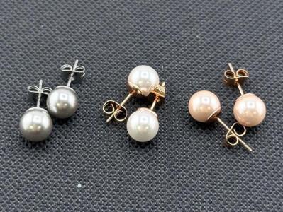 Set of Three Pairs of Pearl Stud Earrings in Gray, White, and Pink