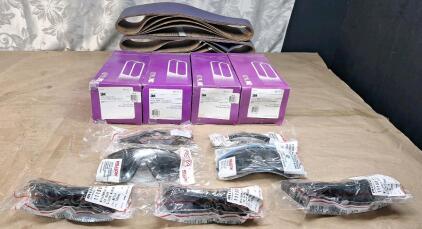 (4) 5-Count Boxes Of 3M 716D Regalite Resin Bond Cloth Sanding Belts, 80-Grit, 4" x 21-3/4", (3) 5-Count Packs Of 3M 716D Regalite Resin Bond Cloth Sanding Belts, 50-Grit, 4" x 36-1/4" & (7) Pair Of Assorted Willson Safety Glasses