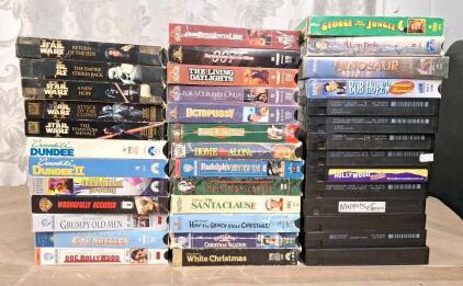 Lot Of (30+) VHS Movies Including Star Wars, James Bond & Assorted Christmas & Kids Movies