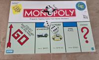 Lot Of (4) Assorted Monopoly Board Games, (3) Atari Joystick Controllers & (1) Pair Of Atari Paddle Controllers - 4