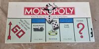Lot Of (4) Assorted Monopoly Board Games, (3) Atari Joystick Controllers & (1) Pair Of Atari Paddle Controllers - 5