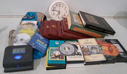 Mixed Educational Media Lot: Fishing, Finance, Books, VHS, CDs, Clocks, Bag &ndash; 25+ Pieces (Turns On)