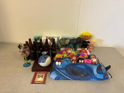 Toy lot: Lilo & Stitch Tapestry, Collectible Troll Dolls, Blue Vase, Darts, Makita 4.5" Corded Angle Grinder with Side Handle & Guard (does not turn on)& more