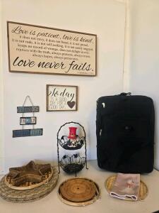 Black Rolling Suitcase with Telescoping Handle and Multiple Compartments, Placemats, Tiered Iron Stand, Wall Decor