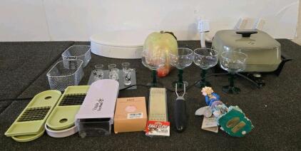 Large lot of mixed cooking equipment, decorations, wine glasses