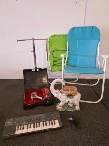 Yamaha PSS-130 Keyboard, Sunmax Gas Stove, 2 Folding Chairs, T-Bar Rack, Elephant Aroma Lamp( lamp powered on) ( shelf B)