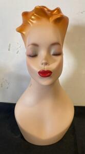 Vintage Female Mannequin Head Display with Stylized Hair and Pierced Ears