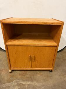 Rolling Oak Finish TV Stand with Cabinet Doors, 2 Shelves, Cable Cutout, and Casters, 32"x18"x30"