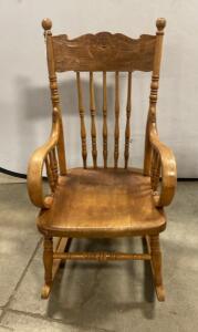 Antique Wooden Rocking Chair with Carved Backrest and Spindle Design 34&rdquo; Tall