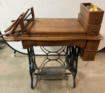 New Goodrich Treadle Sewing Machine, Ornate Oak Cabinet, Cast Iron Base, c. 1890-1910