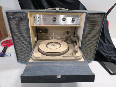 Powers on Emerson P-1920A Stereophonic High Fidelity Phonograph with Dual Fold-Out Speakers