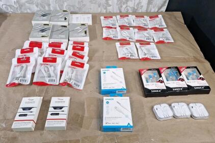 (2) Fm Transmitters, (2) Lighting To Headphone Jack Adapters, (19) Assorted USB A To Lighting Cables, (10) USB C To Lighting Cables & (6) Assorted Pairs Of Wired Earphones