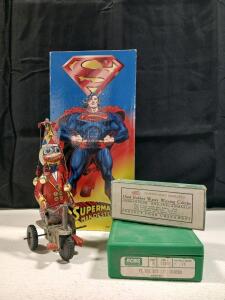 Vintage Tin Wind-Up Duck, Vintage Hard Rubber Water Waving Combs, 1996 Superman figure