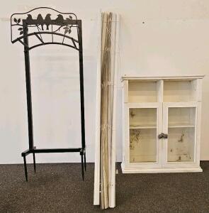Wall Cabinet with Glass Doors, Metal Garden Arch Trellis, and 72x84in Vertical Blinds Set
