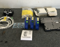 (1) Hewlett-Packard Docking Station (3) Omega Signal Conditioners (1) Video Balun CCTV Via Teisted Pairs (1) Bag Of Various Hardware (1) Unknown Tester