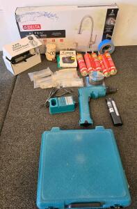 Makita 6010D Cordless Drill/Driver Kit 9.6V with Stick Battery, Charger, and Case (plugged in and functioning) Delta Alpen pull down faucet, 25 foot twisted adio cable, Lee Safety Primer feed, liquid nails