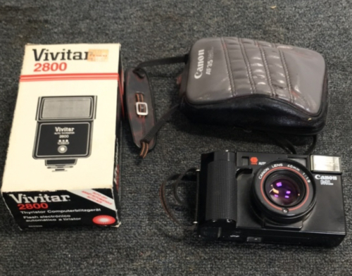 (1) Cannon ML Camera w/ Case & (1) Vivitar 2800 Auto Thyristor Electronic Flash