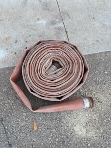 2.5" x 50' Layflat Fire Hose with Threaded Coupling, Rubber Lined, Red, Used Condition