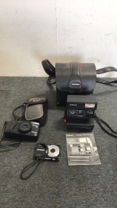 (1) Vintage Polaroid One Step Flash Camera With Case And Manual (1) Ricoh 35 mm Camera (1) Kodak Digital Camera