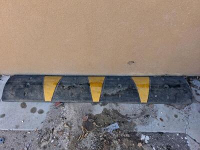 Rubber Speed Bump 6 ft Black/Yellow, Mounting Holes, Used, Fits Parking Lot or Garage