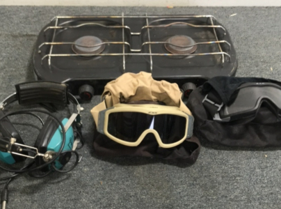 (2) Pairs Of ESS Snowboard Goggles (1) Sigtronics Radio Headset (1) Camp Stove