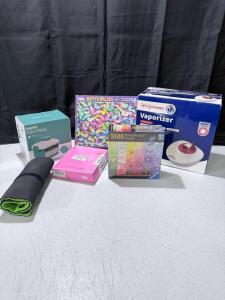 Mixed Lot: Ravensburger 1000-piece Puzzle, Walgreens Vaporizer, Tofu Press, Indoor Putting Set