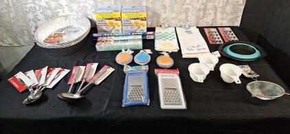 (5) Stainless Steel 10" Serving Spoons, (3) Stainless Steel Soup Ladles, (5) 18" Oval Aluminum Roasting Pans, (4) Microwave Rapid Egg Cookers & More