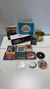 Misc Lot: New Kitchen Utensils, New Ears speaker box, various dvds & CDs, First Edition 1966 "Charlie Brown's All-Stars" by Charles M. Schulz, Hardcover