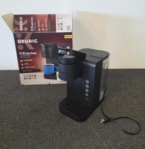 Keurig K-Express Essentials Single-Serve Coffee Maker, 6.5" Wide, 36 oz Reservoir plugged in and Functioning