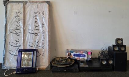 Philips 5.1 Channel 3D Blu-ray, With remote (Functioning) Home Theater System Subwoofer( couldn't properly test for Functioning) Sony DVD player (Functioning), a bracelet maker, two lake house signs, conair mirror,
