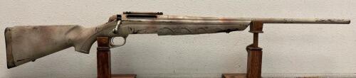 Remington Model 770 .300 Win Mag Bolt-Action Rifle with Camouflage Stock