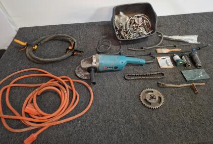 Makita 9027L Electric Angle Grinder, 7-inch Wheel, 6,000 RPM, 15A, Serial No. 5007449( powered on) heavy duty power cord with split., miscellaneous hardware, black tubing.